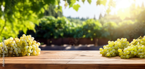 Empty rustic old wooden boards table copy space with blurred vineyard in background. Some grapes on desk. Product display template. Generative AI