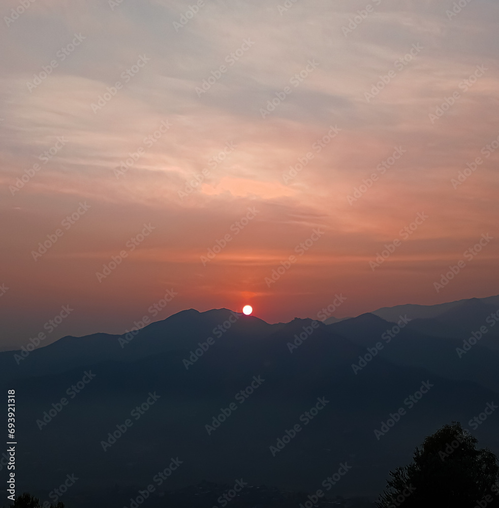 Fototapeta premium sunset over the mountains