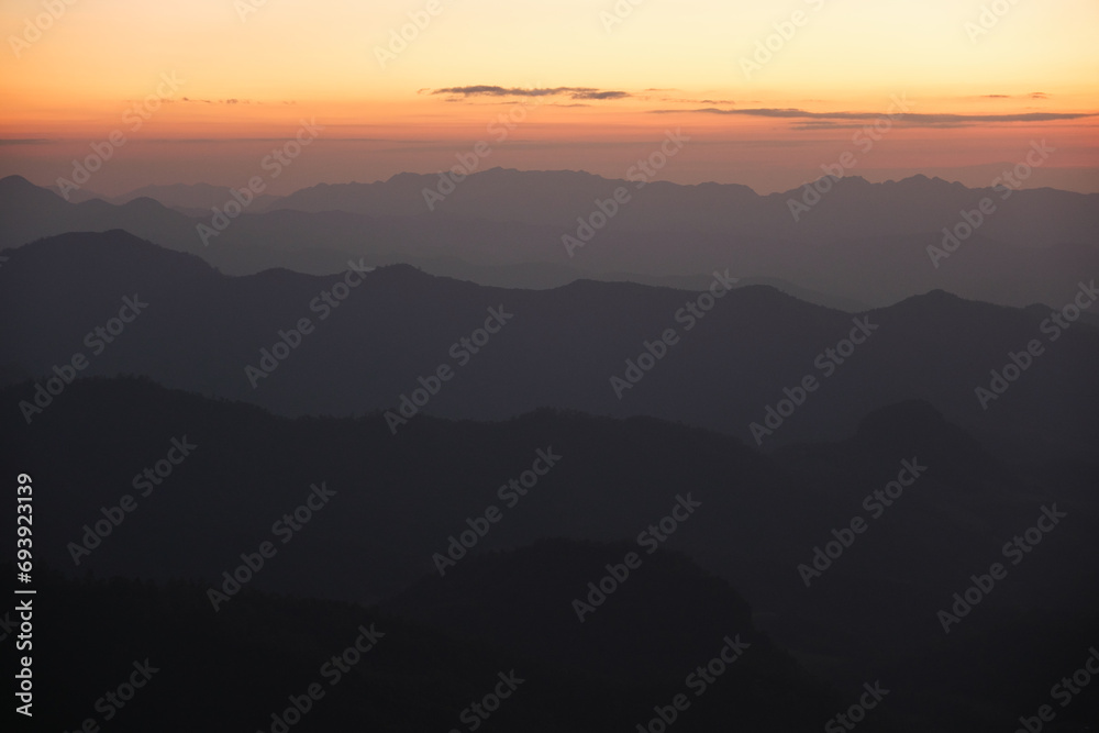 Landscape image of mountains view and colorful sky before sunset