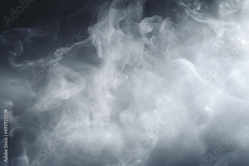 Close-up shot of smoke on a black background. Perfect for adding a mysterious and atmospheric touch to any design