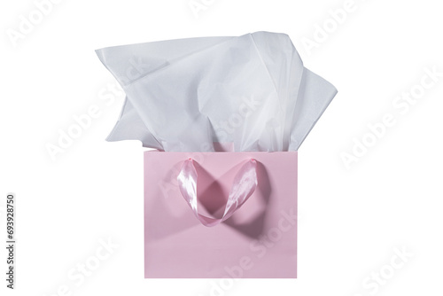 Craft paper gift bag with tissue paper isolated on a white background