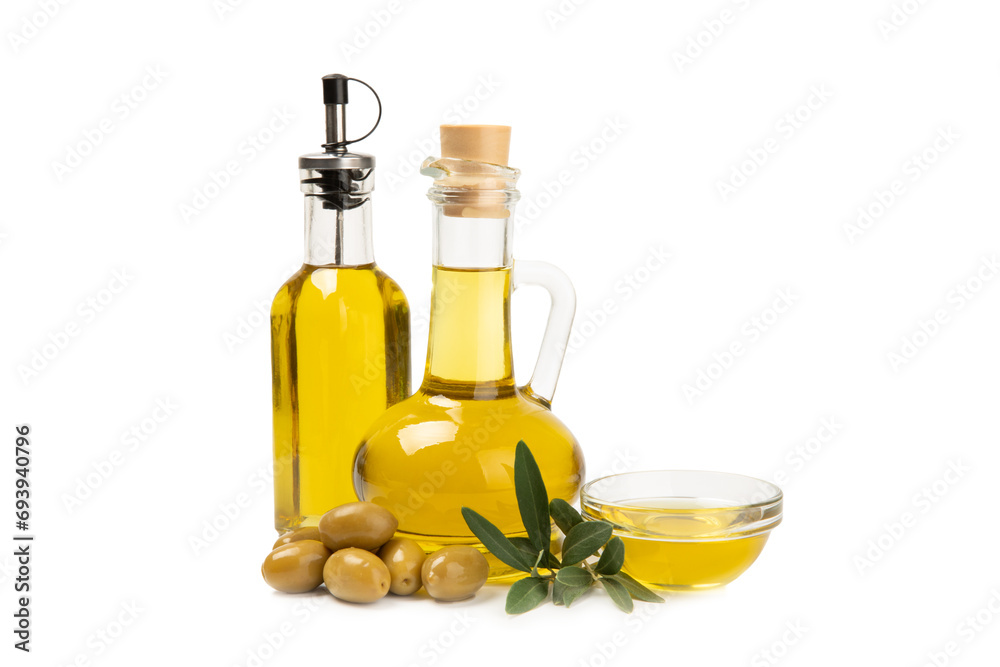 Bottle of fresh olive oil and olives with leaves isolated on white background. Delicious olive oil in a glass bottle. olive oil bottle. Salad dressing. Oil for frying.