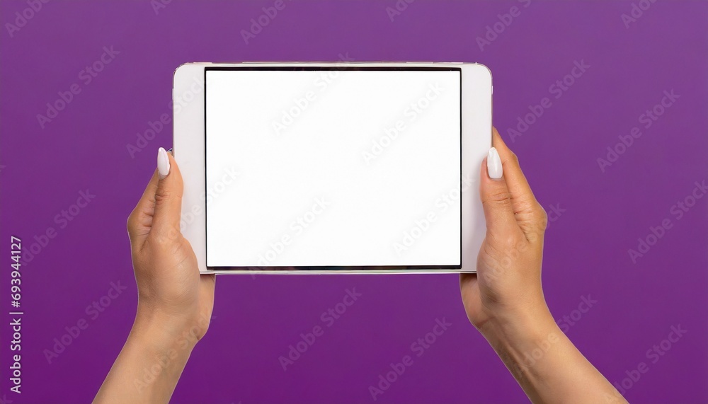 Hands holding white screen tablet, isolated on purple background Hands holding white screen tablet, isolated on purple background