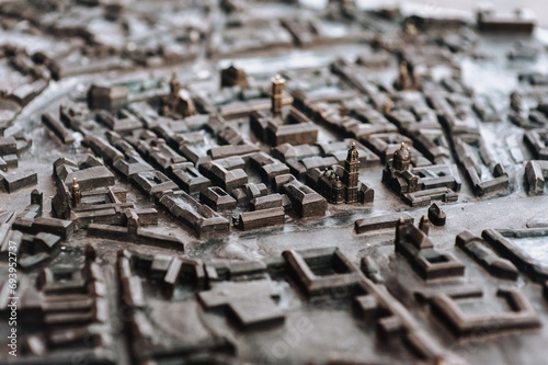 Layout of the old district of Lviv in miniature. A metal model of a medieval city  made of metal and installed in the Rynok Square. Close-up.