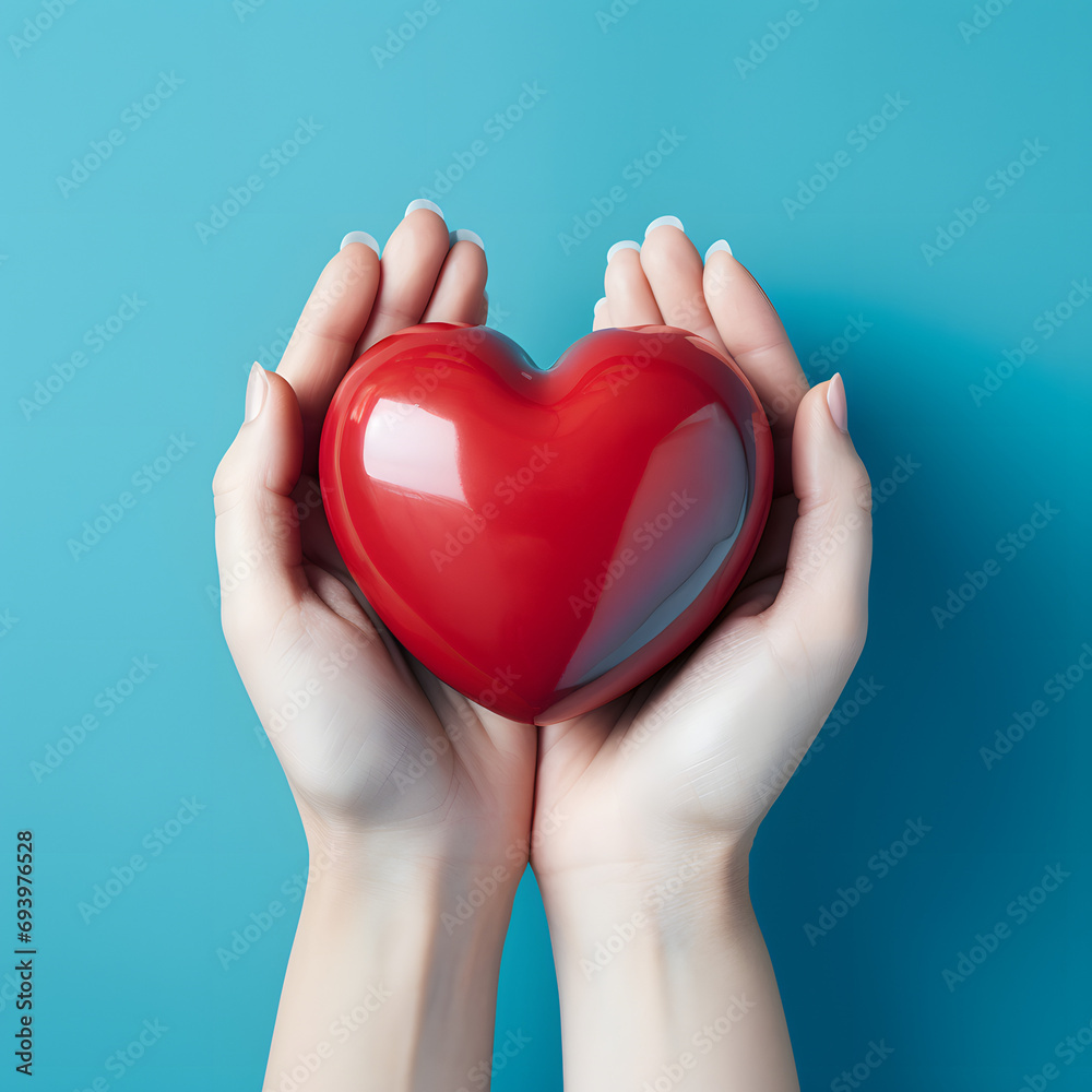 Obraz premium Hands close up holding red heart with blue background generativ ai