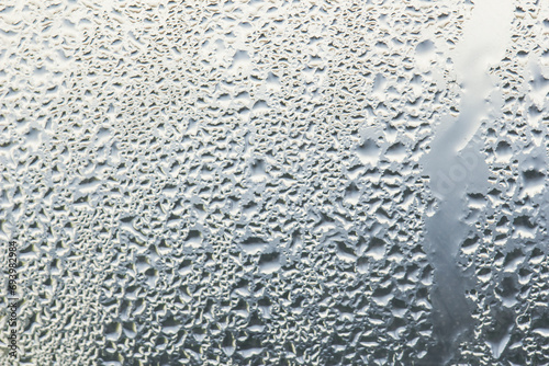 Water drops on the window after rain, wet glass texture
