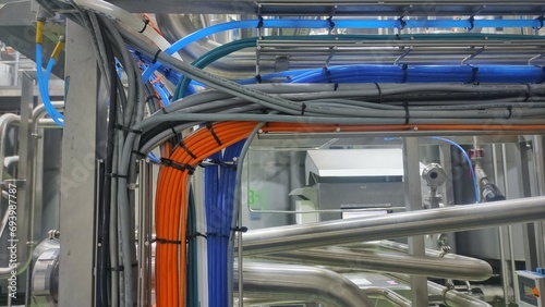 A bundle of colorful cable in production room of factory