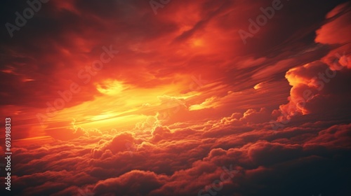 A beautiful sunset with the sun setting over a sea of clouds. Perfect for nature and landscape backgrounds