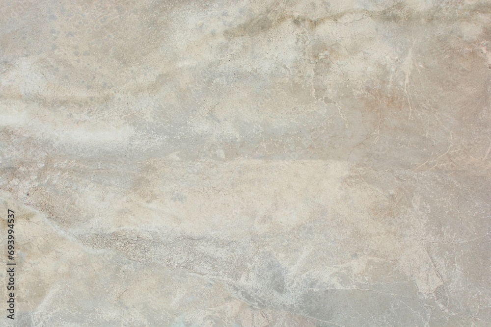 Naklejka premium Background and texture of gray with beige stains cement surface of walls and floor in the interior.