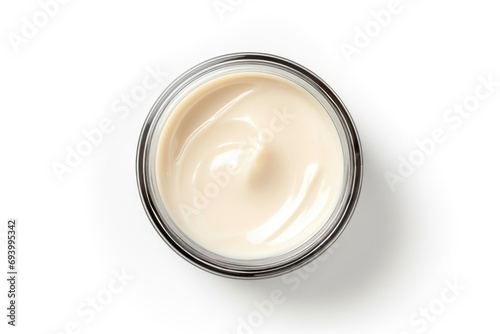 A jar of cream placed on a clean and bright white surface. This image can be used for skincare, beauty products, cosmetics, or health-related designs