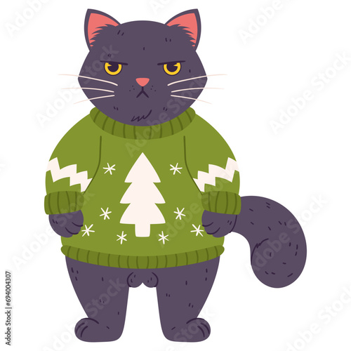 A disgruntled cat stands in a Christmas sweater. Grumpy Fluffy brown colored Cat wearing a green sweater and a drawing of a pine tree on it