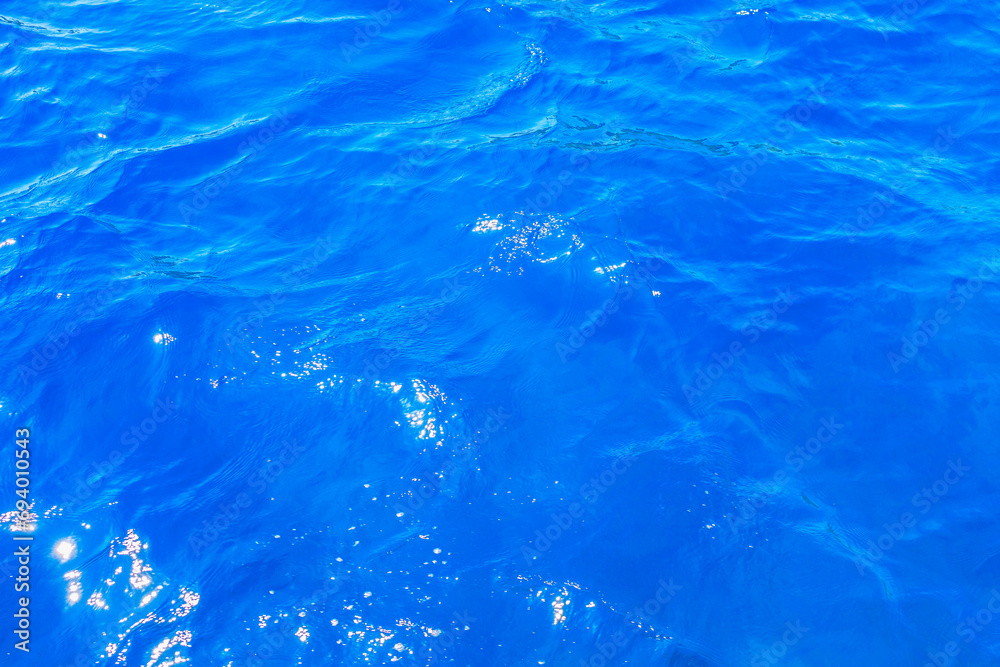 Beautiful clear water of the Aegean Sea. Background with selective focus and copy space