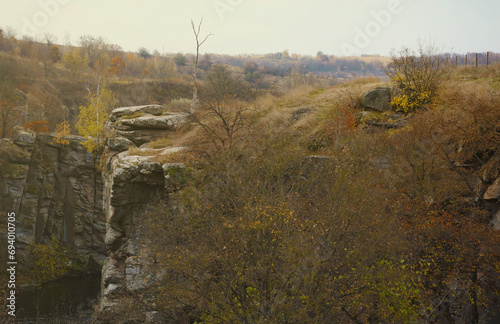 Granite rocks of Bukski Canyon with the Girskyi Tikych River. Picturesque landscape and beautiful place of ukrainian tourism photo