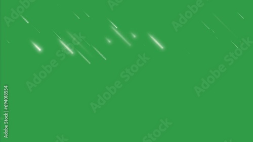Shooting stars with twinkling lights gracefully fall on a green screen background, creating a celestial ambiance. Witness the beauty of blinking and glowing stars descending in the night sky