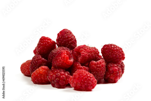 Fresh red raspberries on a white background, raspberries for dessert