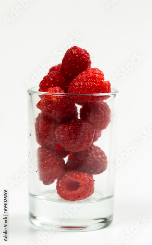 Fresh red raspberries on a white background  raspberries for dessert