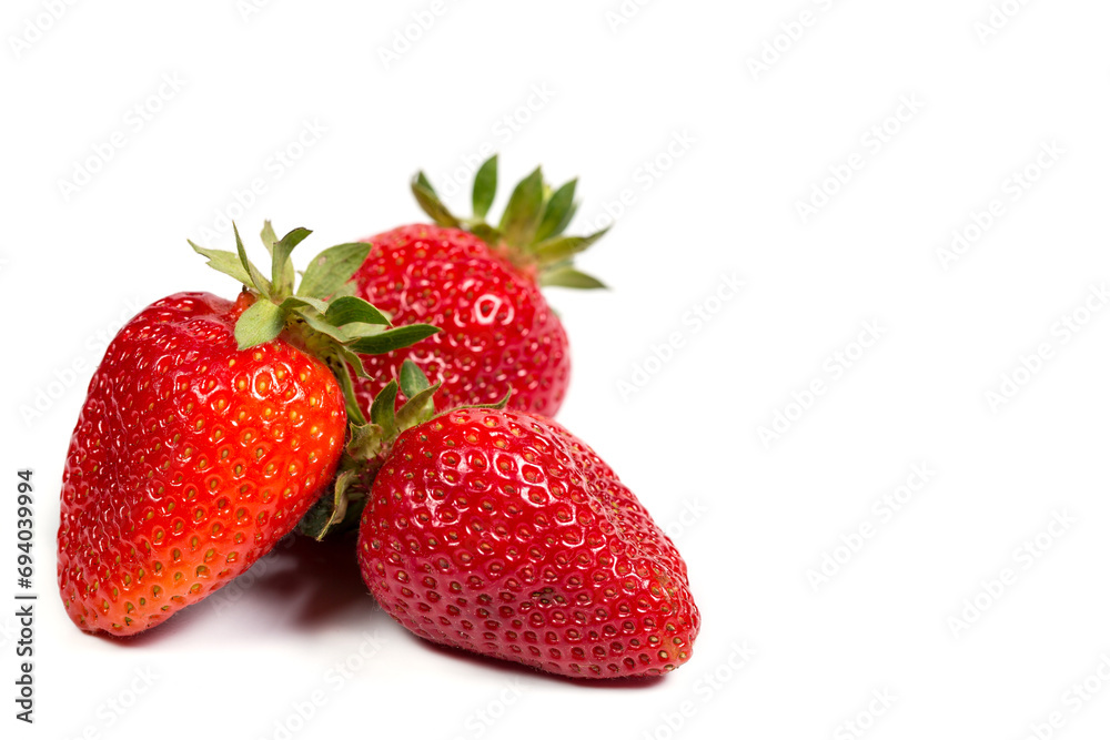 Fresh red strawberries on a white background, sweet strawberries for dessert Fresh red strawberries on a white background, sweet strawberries for dessert