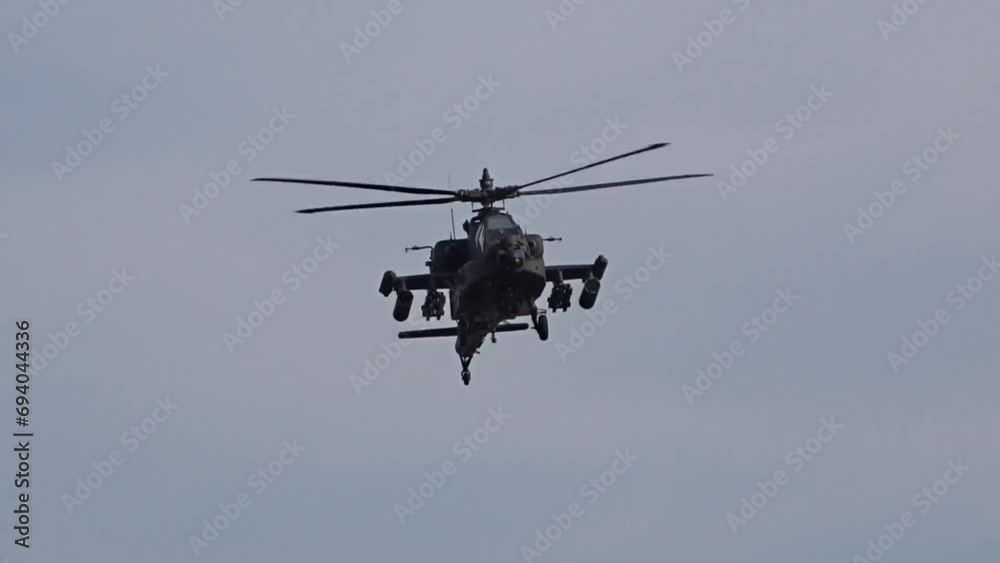 Military helicopter flying directly and close up to the camera Military helicopter flying directly and close up to the camera
