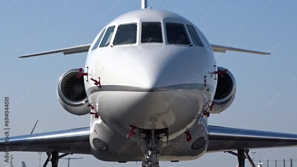 Private Business Corporate Executive Jet Parked at Airport - Close Up Private Business Corporate Executive Jet Parked at Airport - Close Up