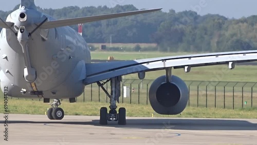Military Tanker and Transport Aircraft Turning left to right at Air Base photo