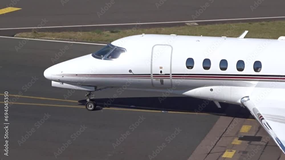 Private Jet Departing at Airport Close Up Taxiing