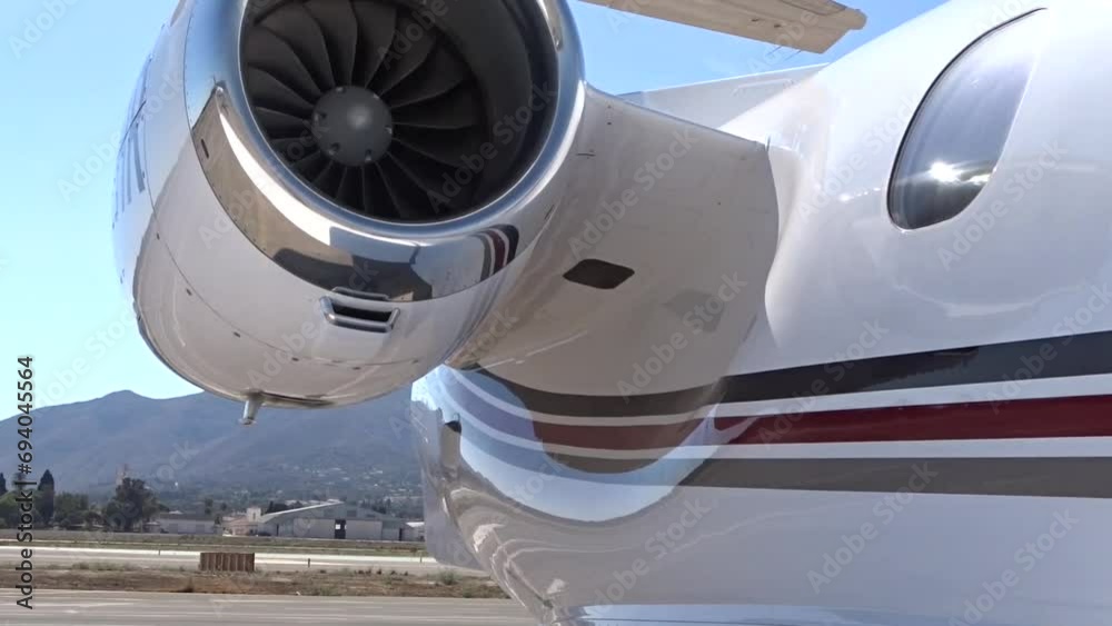 Business Jet Engine Close Up Panning downwards top to bottom Business Jet Engine Close Up Panning downwards top to bottom