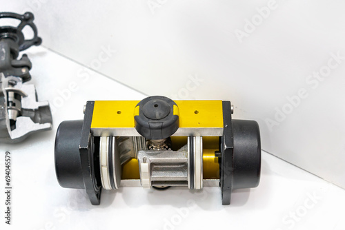 Cut away cross section show detail inside of double acting pneumatic rotary actuator for control turn close and open valve in industrial photo