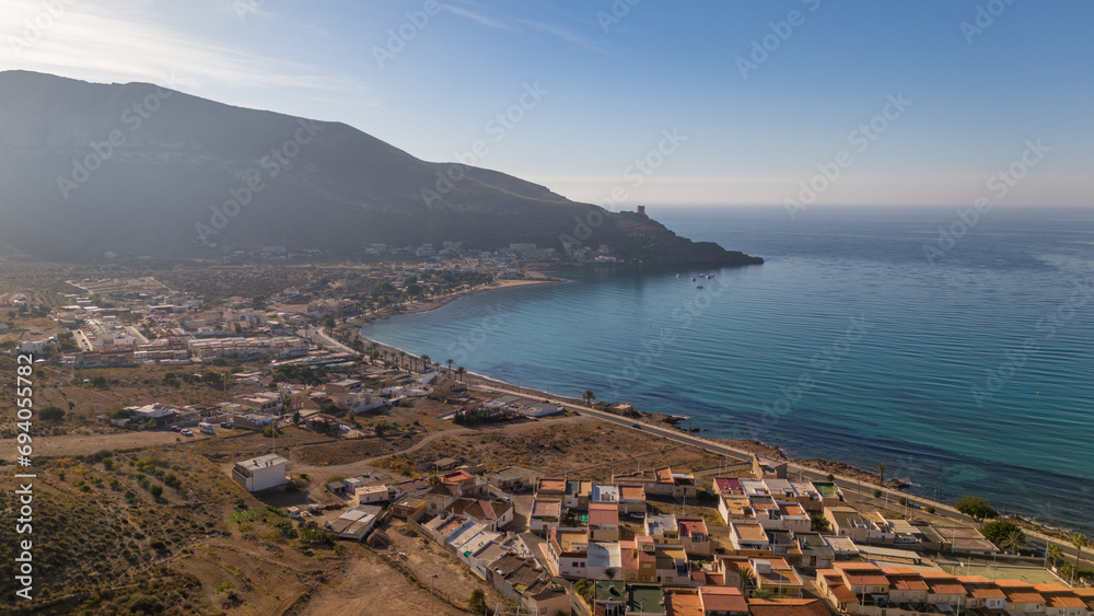 Aerial drone view of the coastal town and beach in La Azohia, Spain