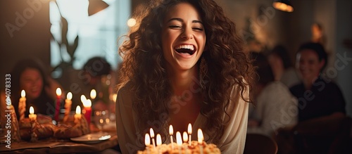 Woman celebrating birthday successfully with friends #694078333
