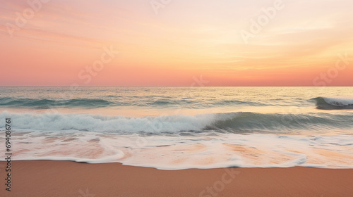 Sunset over ocean  golden and pink hues  soft waves reflection