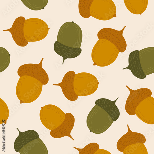 acorns in a cartoon style scattered chaotically across an endless background. yellow and green ripe acorns. food for forest dwellers (ID: 694097197)