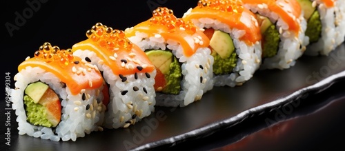 California roll sushi topped with orange roe.