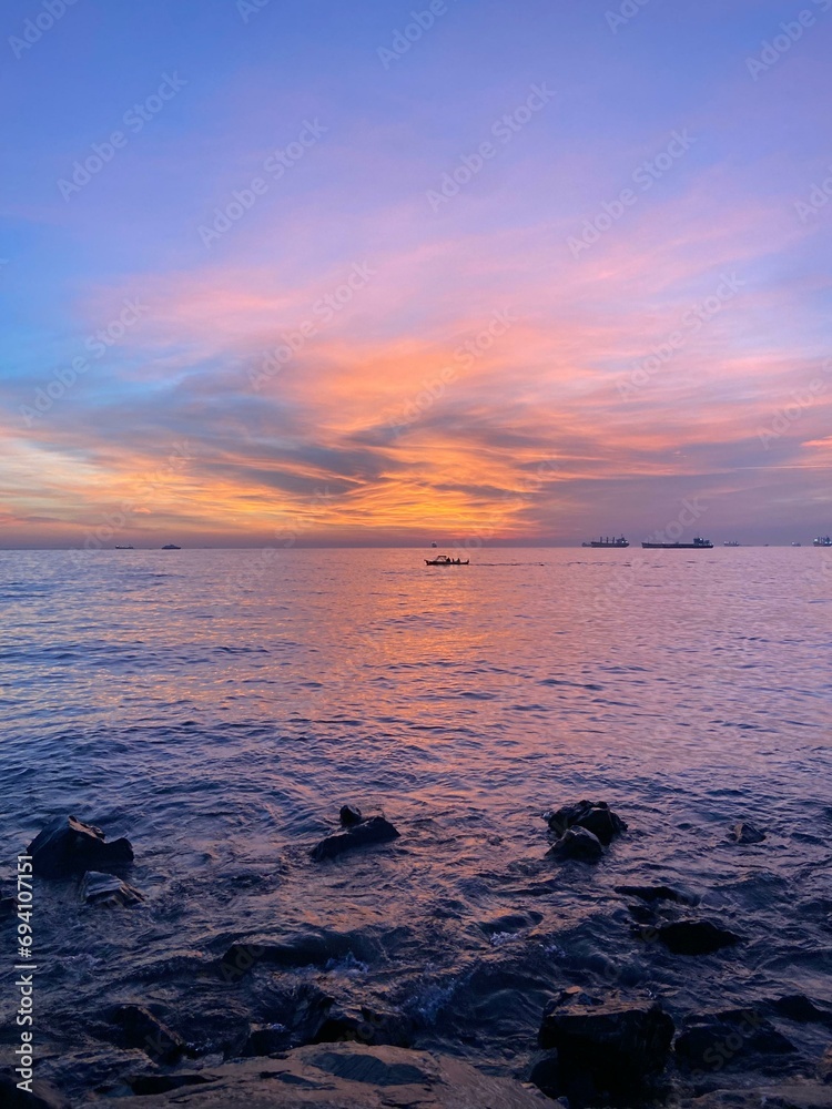 Obraz premium Sunset Over The Sea
