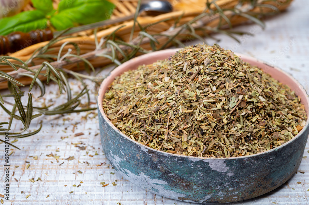 Herbes de Provence, mixture of dried herbs typical of the Provence region, blends often contain savory, marjoram, rosemary, thyme, oregano, lavender leaves, used with grilled food and stew Herbes de Provence, mixture of dried herbs typical of the Provence region, blends often contain savory, marjoram, rosemary, thyme, oregano, lavender leaves, used with grilled food and stew