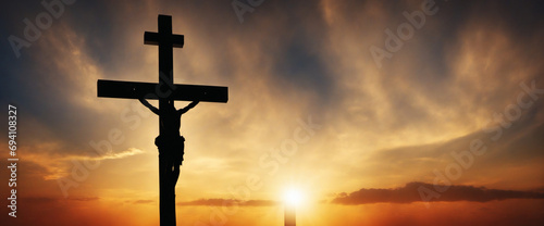 holy cross in a sunset landscape photo