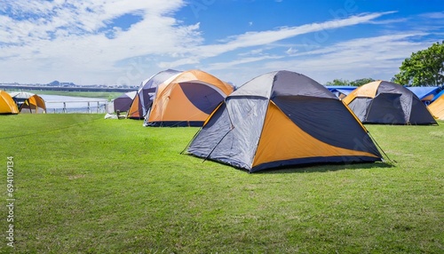 tents for camping on the lawn on a sunny day travel theme