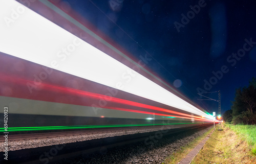 Light trails of a train, concept for high-speed under the stars