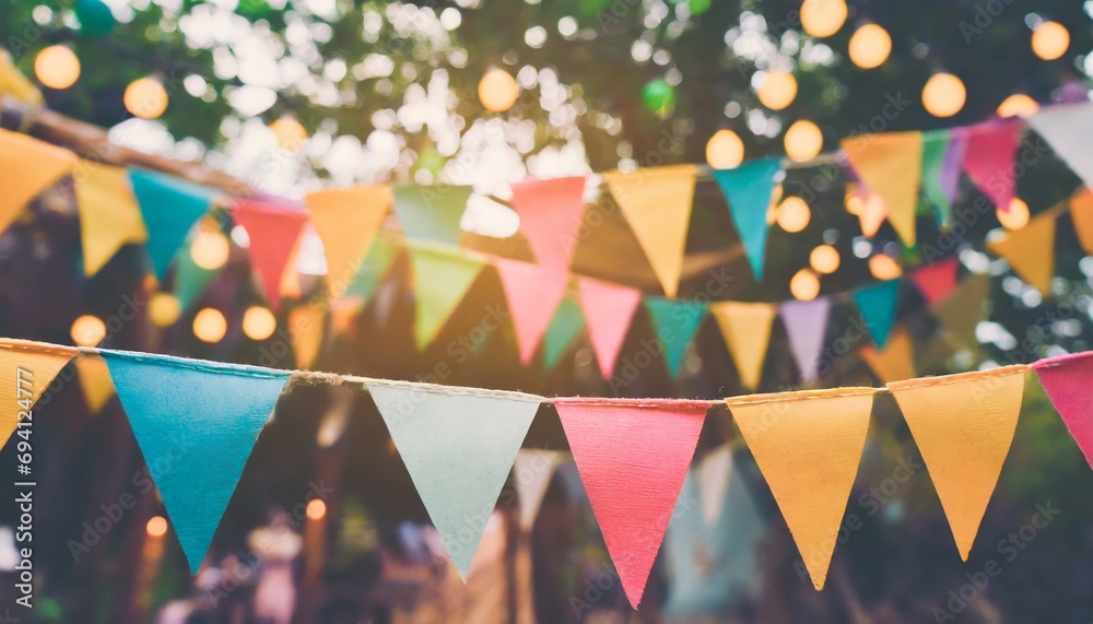 blur background colorful triangular flags of decorated celebrate outdoor party vintage tone - obrazy, fototapety, plakaty 