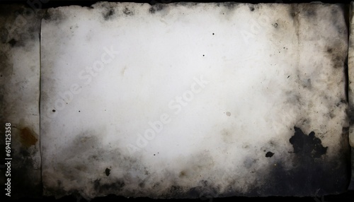 a white weathered paper with vintage texture framed by a black vignette with mold spots to overlay a horror photograph blank sheet for a background