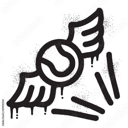Tennis ball graffiti with wings drawn with black spray paint