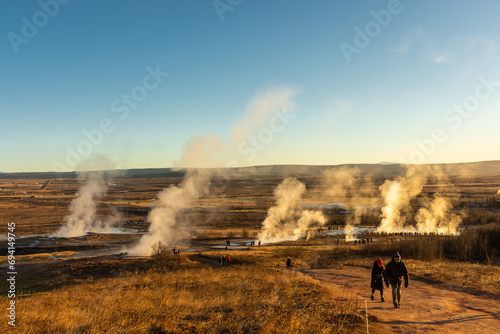  Stokkur geyser spectacular eruption in front of aa crowd of tourists, Iceland