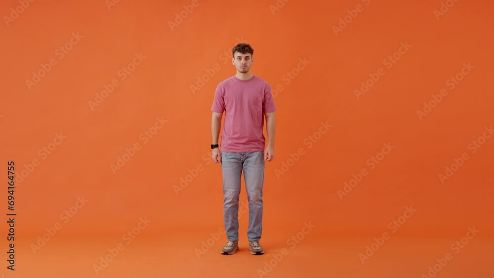 Man jumping on spot and changing outfit into formal attire Man jumping on spot and changing outfit into formal attire