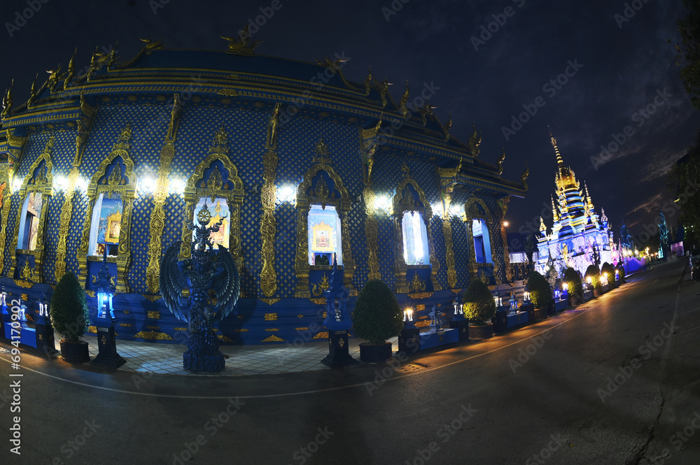 Night scene of the beauty blue temple of Wat Rong Suea Ten It is a unique applied art using shades of blue and sky contrasting with gold and various patterns that flow. Located Chiang Rai,Thailand.