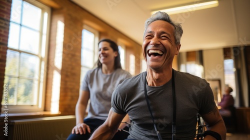 Adult Latin American man doing physical therapy using elastic bands. photo