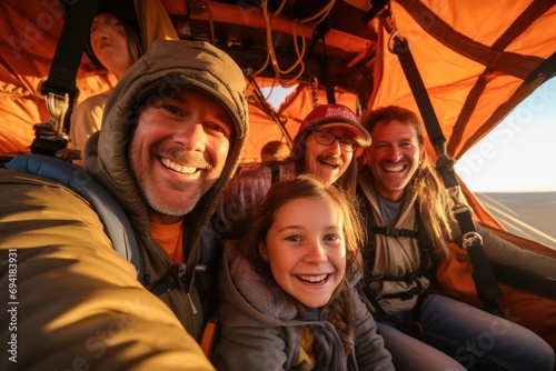 Wide shot of family and friends on early morning hot air balloon