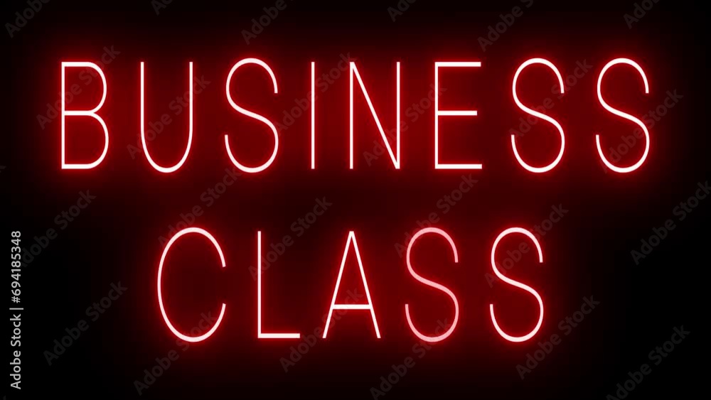 Flickering red retro style neon sign glowing against a black background for BUSINESS CLASS Flickering red retro style neon sign glowing against a black background for BUSINESS CLASS