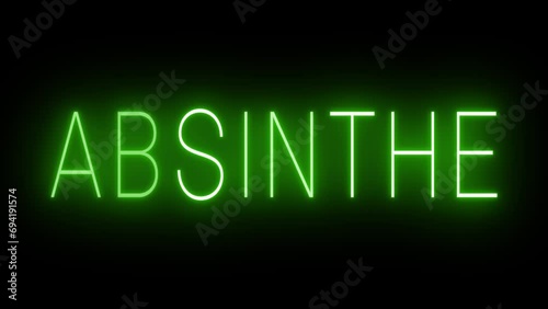 Flickering green retro style neon sign glowing against a black background for ABSINTHE photo
