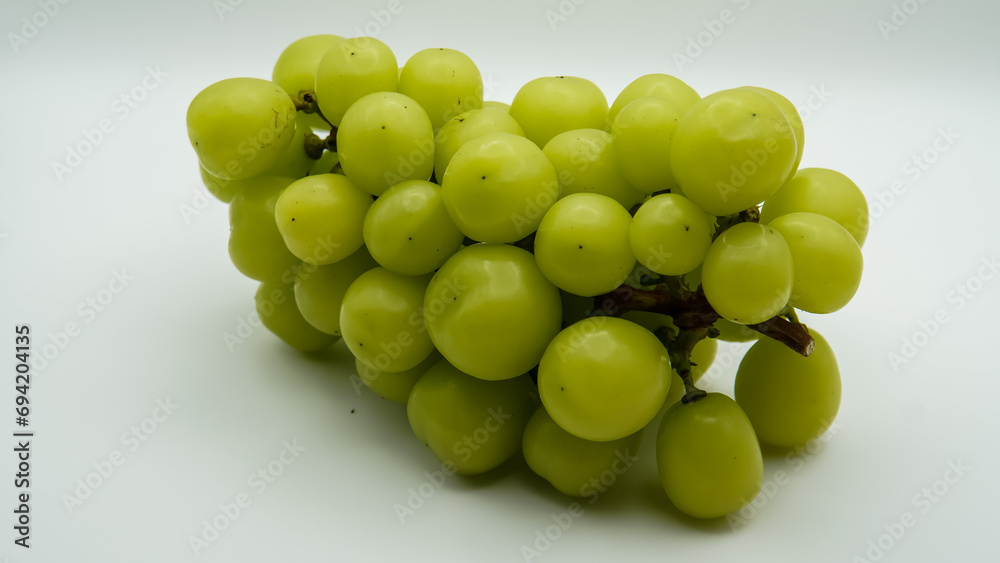 Shine Muscat isolated on white background. Japanese green grapes.