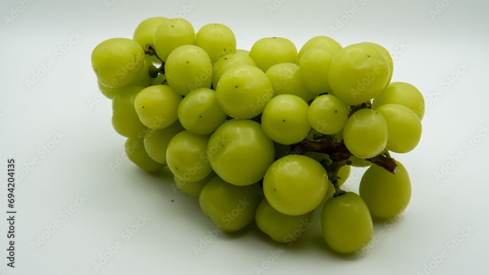 Shine Muscat isolated on white background. Japanese green grapes. Shine Muscat isolated on white background. Japanese green grapes.
