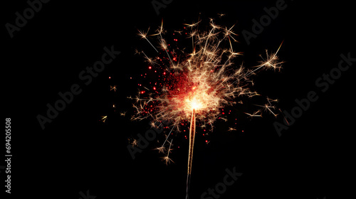 Glittering burning sparkler